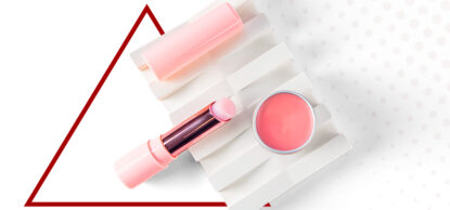 lip balm products against white background with red triangle